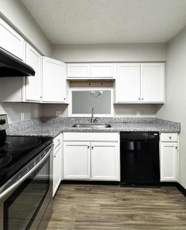 404 Bainbridge Ct Unit E3, Lexington, KY 40509 - kitchen featuring black dishwasher, stainless steel electric stove, dark wood-type flooring, and white cabinetry