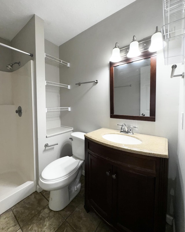 404 Bainbridge Ct Unit E3, Lexington, KY 40509 - full bathroom featuring vanity, tile patterned floors, and a shower