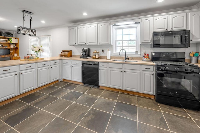 204 Tecumseh Trl, Frankfort, KY 40601 - kitchen with black appliances, healthy amount of natural light, white cabinetry, recessed lighting, and light countertops