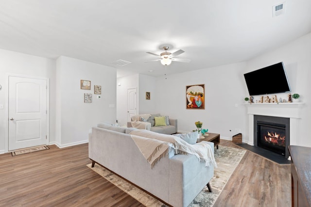137 Kirkstall Way, Georgetown, KY 40324 - living area featuring wood finished floors, ceiling fan, and a fireplace with flush hearth