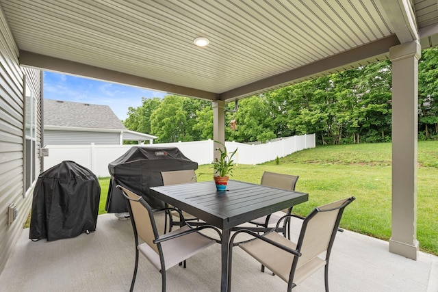 137 Kirkstall Way, Georgetown, KY 40324 - fenced backyard featuring outdoor dining space, a patio area, grilling area, and view of scattered trees