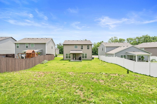 137 Kirkstall Way, Georgetown, KY 40324 - back of property with a residential view, a fenced backyard, and a patio