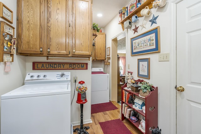 3092 Arrowhead Dr, Lexington, KY 40503 - laundry area featuring washing machine and dryer, light wood-style flooring, cabinet space, and recessed lighting