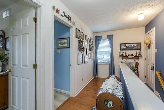 3092 Arrowhead Dr, Lexington, KY 40503 - corridor with wood finished floors and a textured ceiling