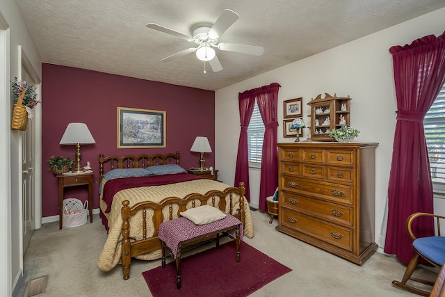3092 Arrowhead Dr, Lexington, KY 40503 - carpeted bedroom with a textured ceiling and a ceiling fan