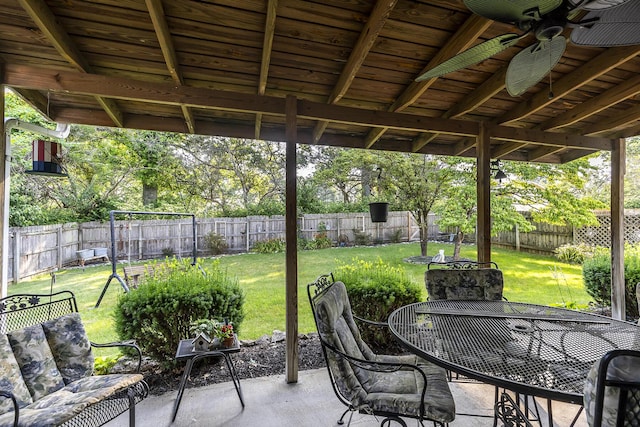 3092 Arrowhead Dr, Lexington, KY 40503 - fenced backyard featuring a patio area, outdoor dining area, and ceiling fan