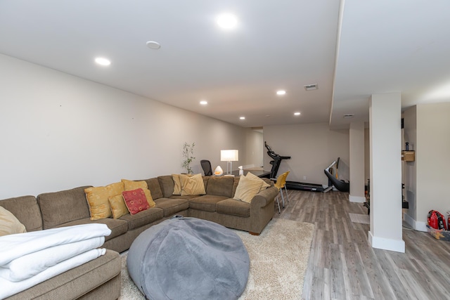 2301 Harrodsburg Rd, Lawrenceburg, KY 40342 - living room featuring light wood-style flooring, recessed lighting, and baseboard heating