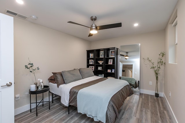 2301 Harrodsburg Rd, Lawrenceburg, KY 40342 - bedroom with wood finished floors, ceiling fan, and recessed lighting