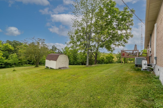 2301 Harrodsburg Rd, Lawrenceburg, KY 40342 - view of green lawn with a storage shed and a deck
