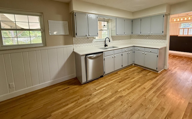 123 Hillandale Dr, Somerset, KY 42501 - kitchen featuring dishwasher, light wood-style floors, light countertops, and a wainscoted wall