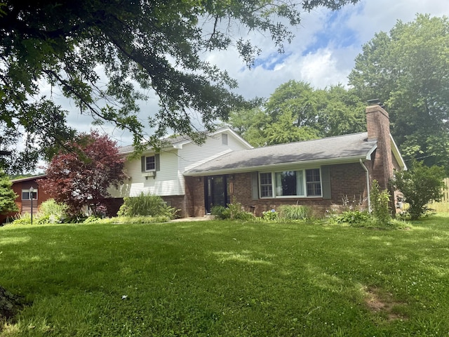 123 Hillandale Dr, Somerset, KY 42501 - split level home featuring a front lawn, brick siding, and a chimney
