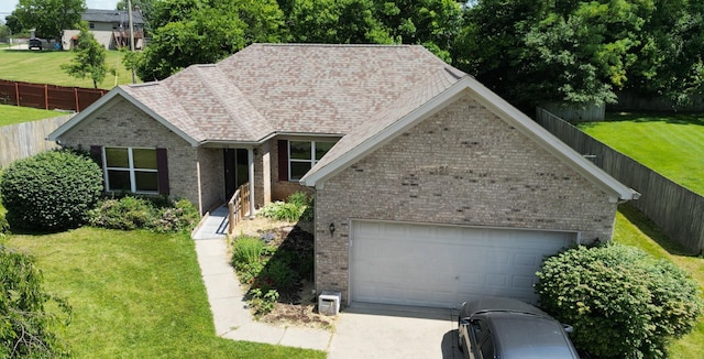 208 Secretariat Dr, Lawrenceburg, KY 40342 - ranch-style house with brick siding, concrete driveway, and a garage