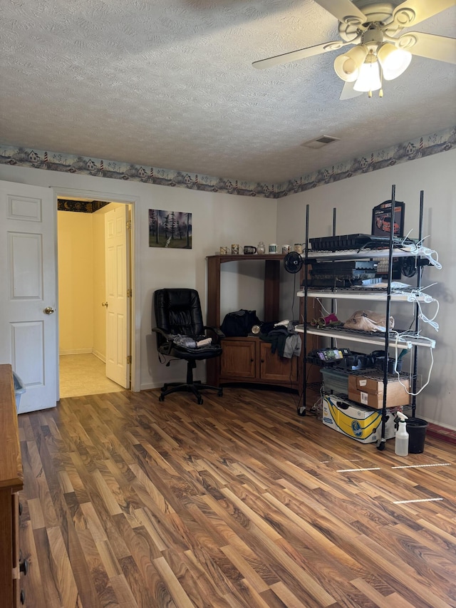 208 Secretariat Dr, Lawrenceburg, KY 40342 - office space featuring wood finished floors, a textured ceiling, and a ceiling fan