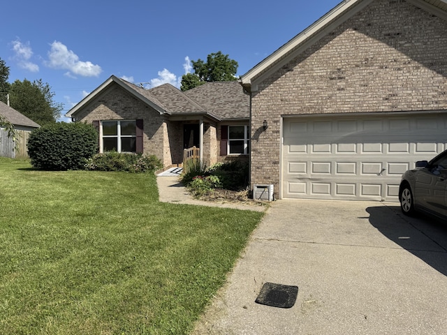208 Secretariat Dr, Lawrenceburg, KY 40342 - ranch-style home with brick siding, a front lawn, concrete driveway, and a garage
