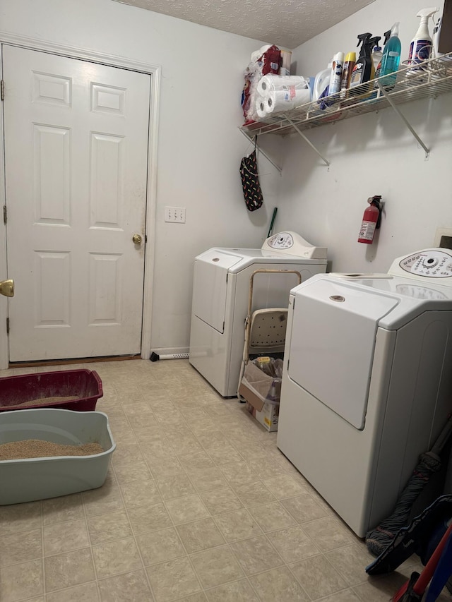 208 Secretariat Dr, Lawrenceburg, KY 40342 - laundry room featuring independent washer and dryer, light floors, and a textured ceiling