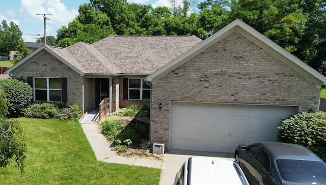 208 Secretariat Dr, Lawrenceburg, KY 40342 - single story home featuring brick siding, a garage, driveway, and a front lawn
