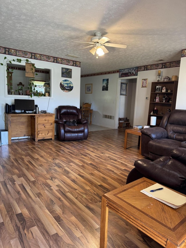 208 Secretariat Dr, Lawrenceburg, KY 40342 - living room with ceiling fan, wood finished floors, and a textured ceiling