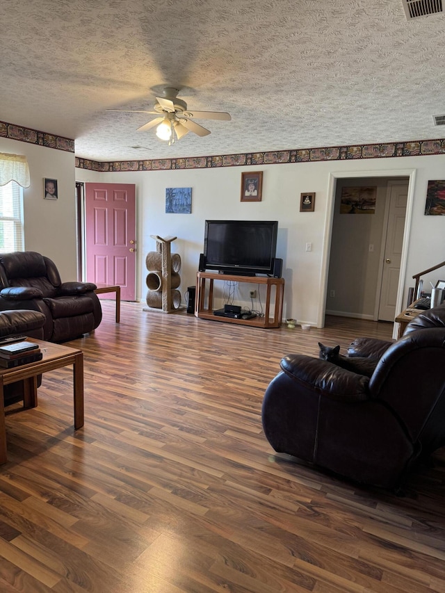 208 Secretariat Dr, Lawrenceburg, KY 40342 - living room featuring a textured ceiling, ceiling fan, and dark wood-style floors