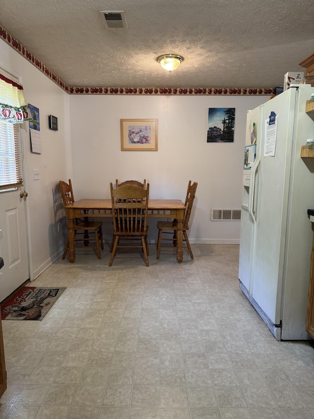 208 Secretariat Dr, Lawrenceburg, KY 40342 - dining space featuring a textured ceiling