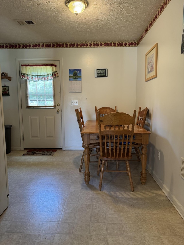 208 Secretariat Dr, Lawrenceburg, KY 40342 - dining space with a textured ceiling and baseboards