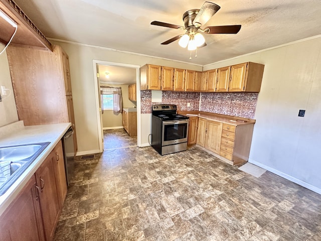 21 Herb Neal Rd, Pine Knot, KY 42635 - kitchen featuring appliances with stainless steel finishes, a ceiling fan, tasteful backsplash, ornamental molding, and light countertops