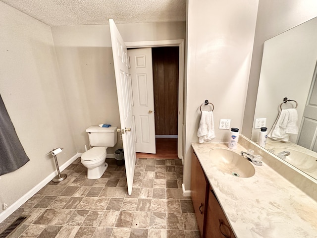 21 Herb Neal Rd, Pine Knot, KY 42635 - bathroom featuring vanity, a textured ceiling, and stone finish flooring