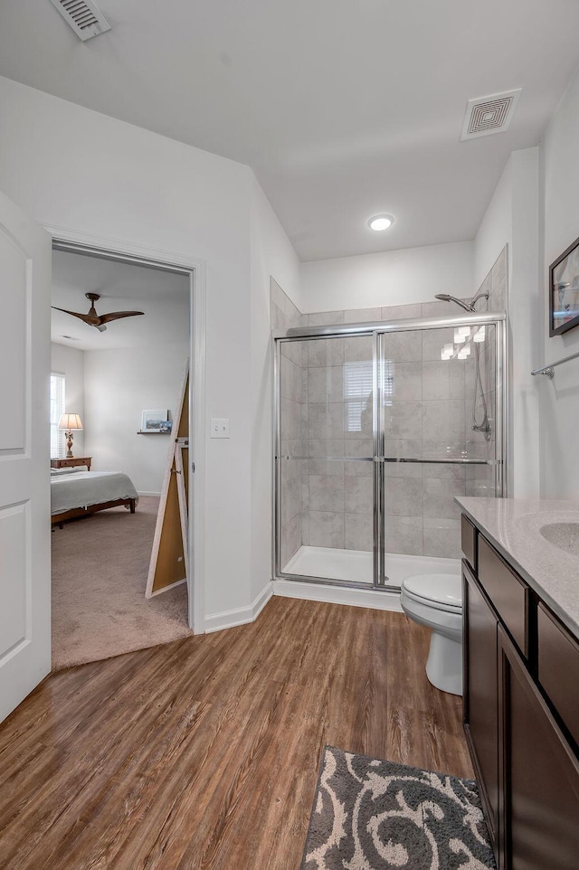 117 Mcafee Dr, Nicholasville, KY 40356 - ensuite bathroom featuring vanity, wood finished floors, a stall shower, recessed lighting, and ceiling fan