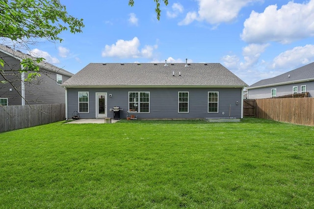 117 Mcafee Dr, Nicholasville, KY 40356 - rear view of house with a patio, a fenced backyard, and a shingled roof
