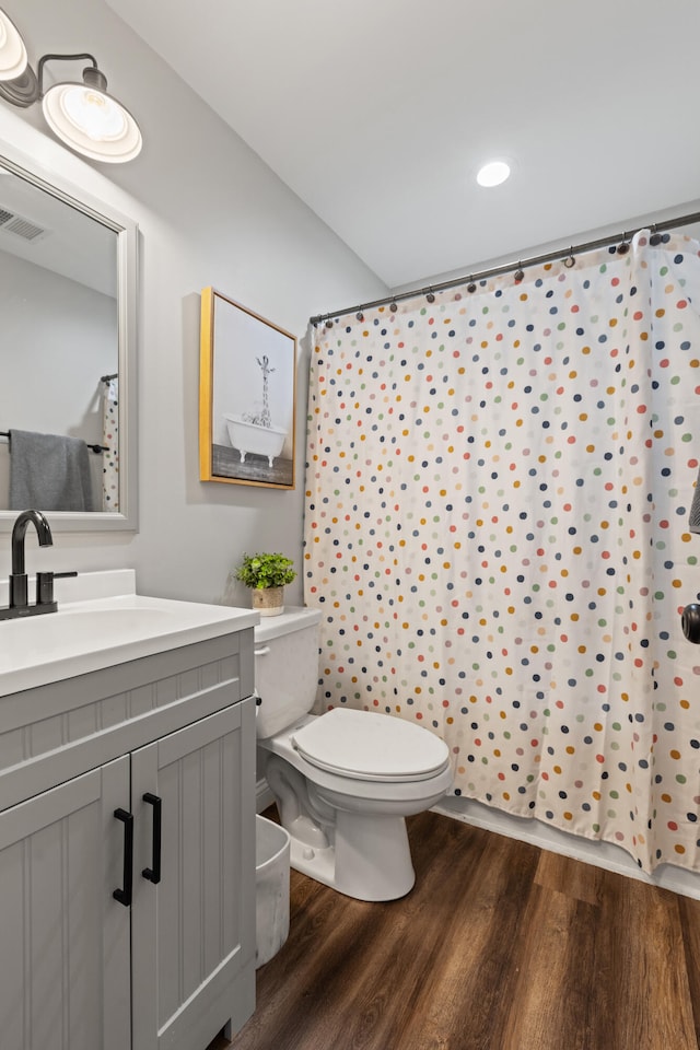 309 Memory Ln, Richmond, KY 40475 - full bathroom with wood finished floors, vanity, and curtained shower