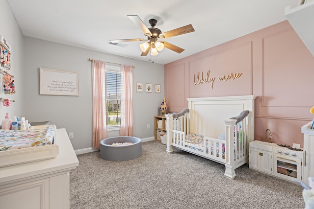 309 Memory Ln, Richmond, KY 40475 - bedroom with a nursery area, light colored carpet, and a ceiling fan