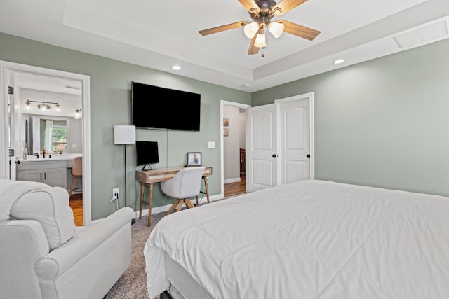 309 Memory Ln, Richmond, KY 40475 - carpeted bedroom with recessed lighting, a tray ceiling, ensuite bathroom, a desk, and a ceiling fan