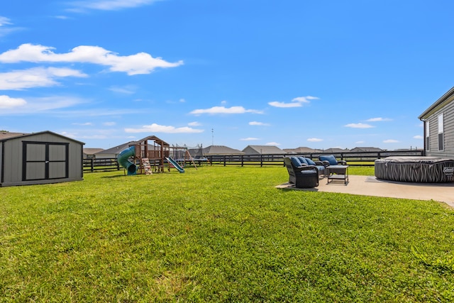 309 Memory Ln, Richmond, KY 40475 - fenced backyard with a playground, a patio, and a shed