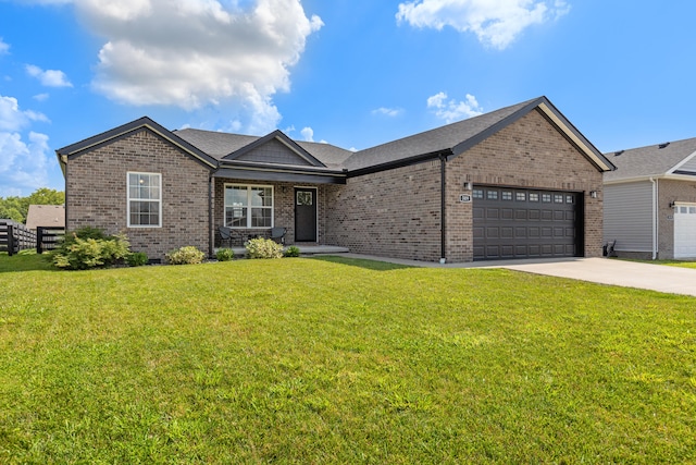 309 Memory Ln, Richmond, KY 40475 - ranch-style home featuring brick siding, an attached garage, driveway, and covered porch
