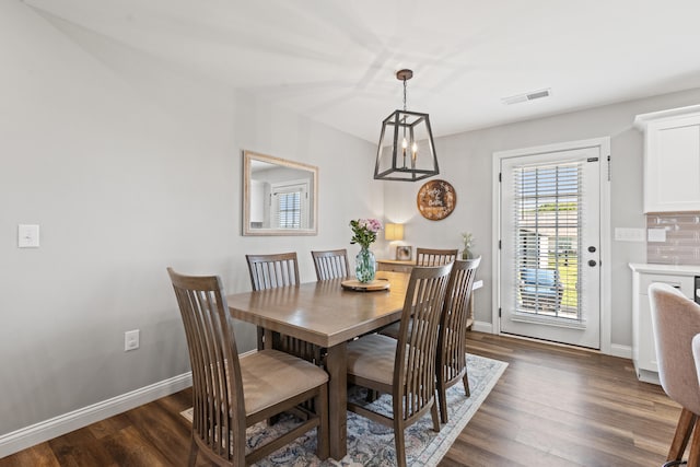 309 Memory Ln, Richmond, KY 40475 - dining room with dark wood-style floors and a chandelier