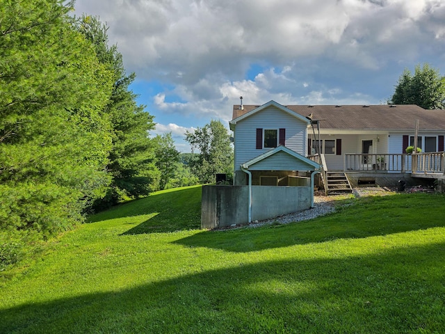 1445 Bastin Creek Rd, Kings Mountain, KY 40442 - back of house featuring a wooden deck, a chimney, a lawn, and stairs