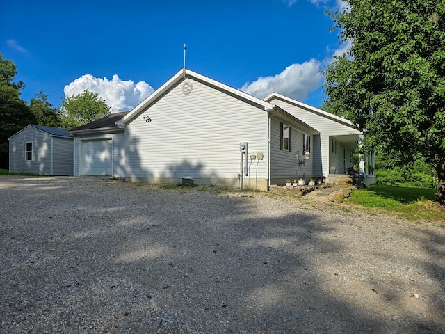 1445 Bastin Creek Rd, Kings Mountain, KY 40442 - view of property exterior featuring driveway and a garage