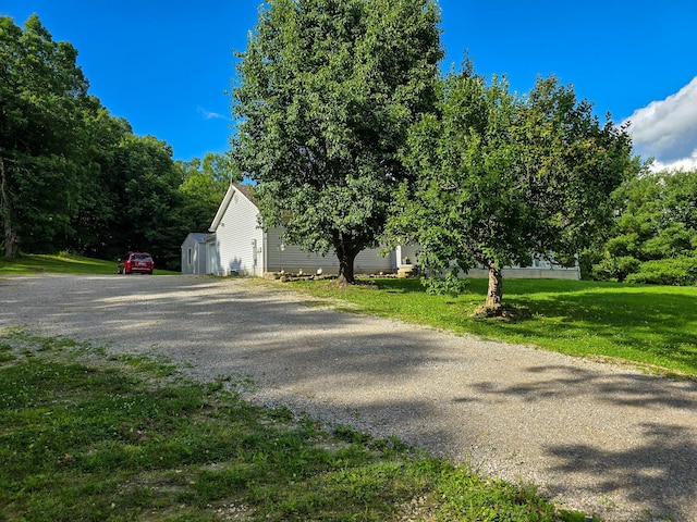 1445 Bastin Creek Rd, Kings Mountain, KY 40442 - view of property exterior featuring gravel driveway and a yard