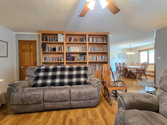 1445 Bastin Creek Rd, Kings Mountain, KY 40442 - living area featuring light wood-style flooring, ceiling fan, and a chandelier