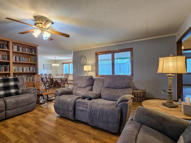 1445 Bastin Creek Rd, Kings Mountain, KY 40442 - living area with wood finished floors, a ceiling fan, a textured ceiling, and crown molding