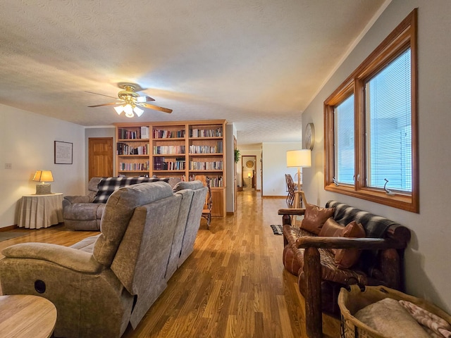 1445 Bastin Creek Rd, Kings Mountain, KY 40442 - living area with wood finished floors, ceiling fan, and a textured ceiling