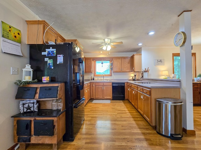 1445 Bastin Creek Rd, Kings Mountain, KY 40442 - kitchen with black appliances, light wood-type flooring, ceiling fan, recessed lighting, and a peninsula