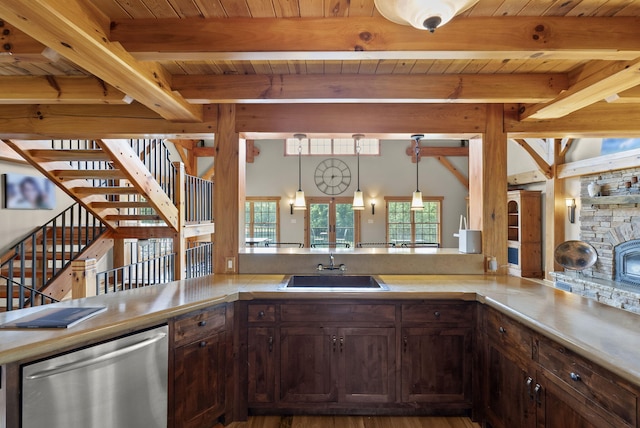 4111 Stanford Rd, Danville, KY 40422 - kitchen featuring dishwasher, plenty of natural light, light countertops, a wood ceiling with exposed beams, and dark brown cabinets