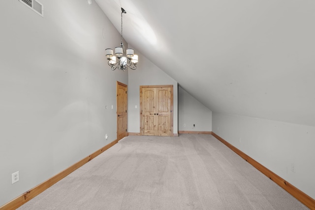 4111 Stanford Rd, Danville, KY 40422 - additional living space featuring vaulted ceiling, a chandelier, and light colored carpet