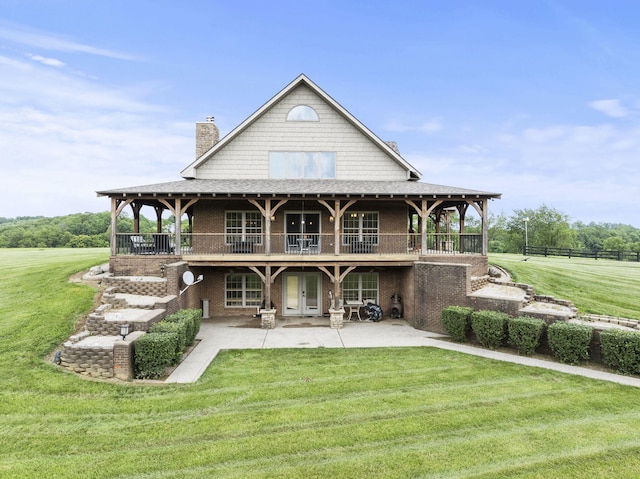 4111 Stanford Rd, Danville, KY 40422 - rear view of property featuring a patio, french doors, brick siding, a chimney, and a deck