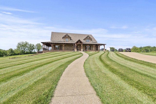 4111 Stanford Rd, Danville, KY 40422 - view of front of home with a front yard, driveway, a shingled roof, and covered porch