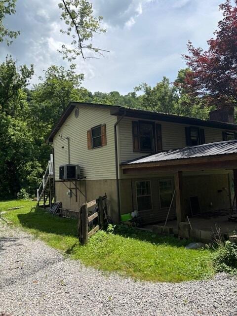 420 Palisades Rd, Harrodsburg, KY 40330 - view of home's exterior with stairs, driveway, and a yard