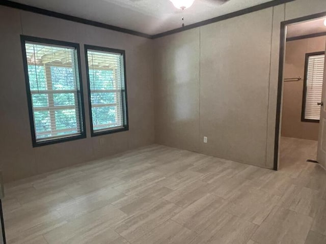 265 Jesse Sears Rd, Somerset, KY 42501 - spare room with light wood-style flooring, crown molding, and ceiling fan