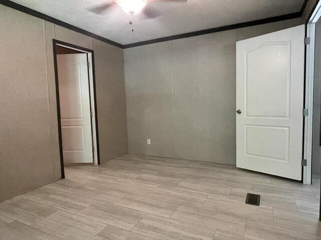 265 Jesse Sears Rd, Somerset, KY 42501 - empty room featuring ceiling fan and crown molding