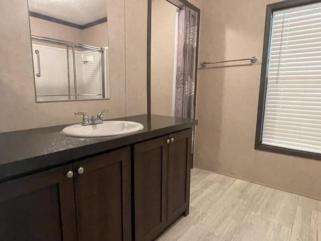 265 Jesse Sears Rd, Somerset, KY 42501 - bathroom featuring vanity, an enclosed shower, and wood finished floors