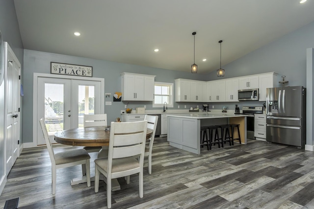 2562 High Bridge Rd, Lancaster, KY 40444 - dining room featuring dark wood-style floors, french doors, recessed lighting, and vaulted ceiling